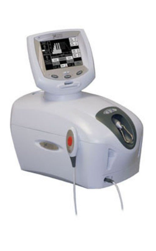 TX Traction Unit medical device with a digital control screen and handheld applicator.